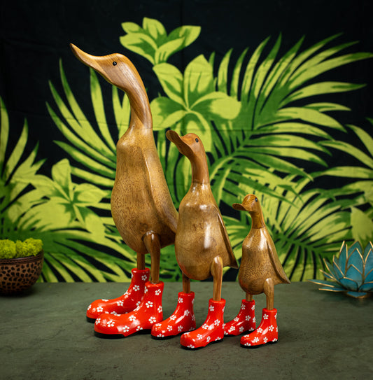 Hand Carved, Hand Painted Wooden Sculpture of a Duck in Shiny Orange Boots with Flowers