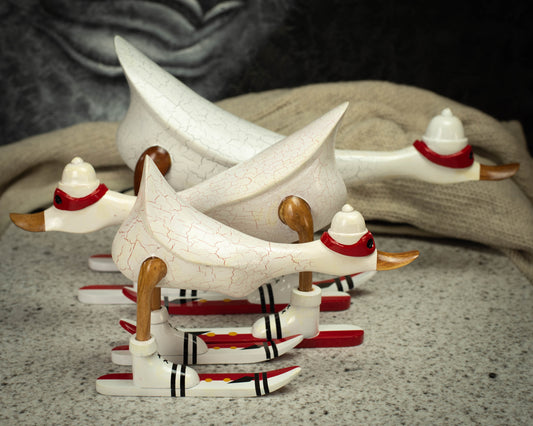 Hand Carved, Hand Painted Wooden Sculpture of a White Duck on Skis