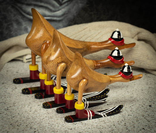 Hand Carved, Natural Wooden Sculpture of a Duck on Skis