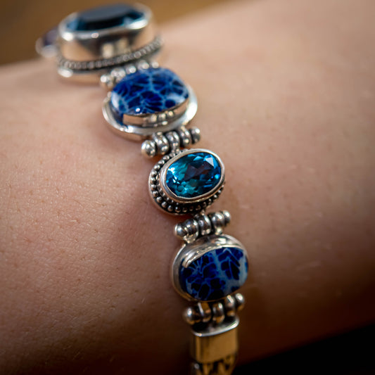 Sterling Silver Chain Bracelet With Oval Blue Topaz And Blue Coral, 7"