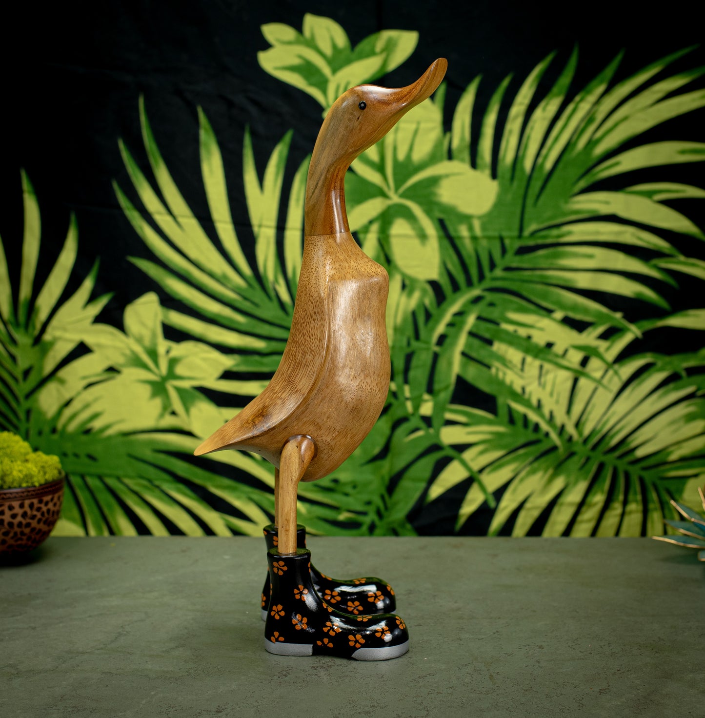 Hand Carved, Hand Painted Wooden Sculpture of a Duck in Shiny Black Boots with Flowers