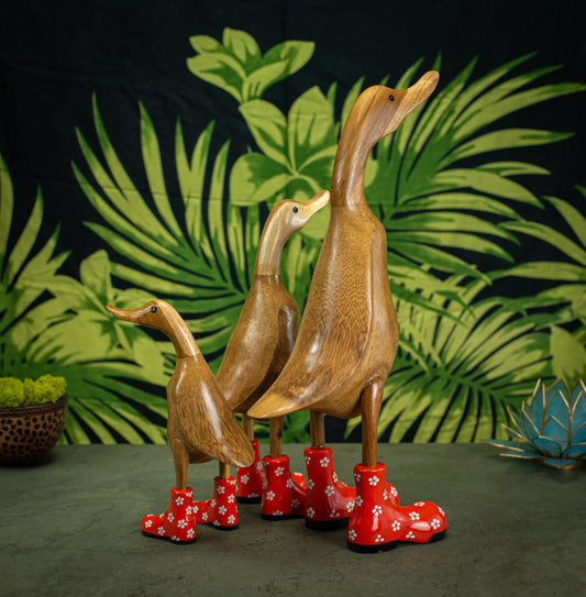 Hand Carved, Hand Painted Wooden Sculpture of a Duck in Shiny Orange Boots with Flowers
