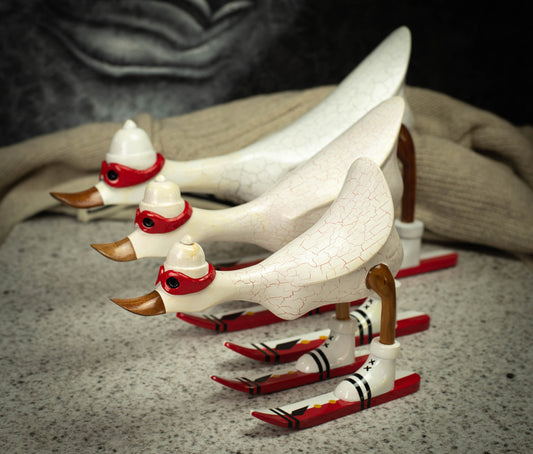Hand Carved, Hand Painted Wooden Sculpture of a White Duck on Skis