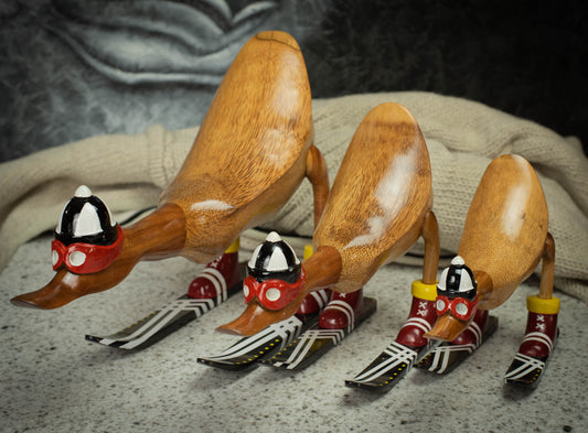 Hand Carved, Natural Wooden Sculpture of a Duck on Skis